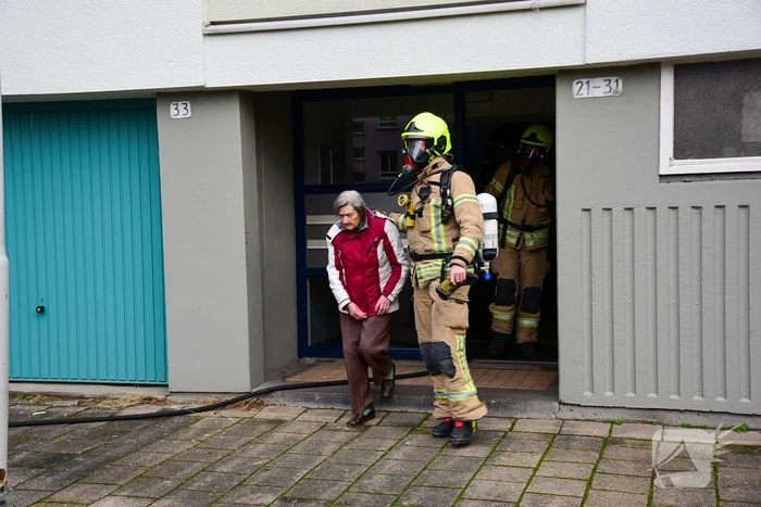 Meerdere flatwoningen ontruimd door brand