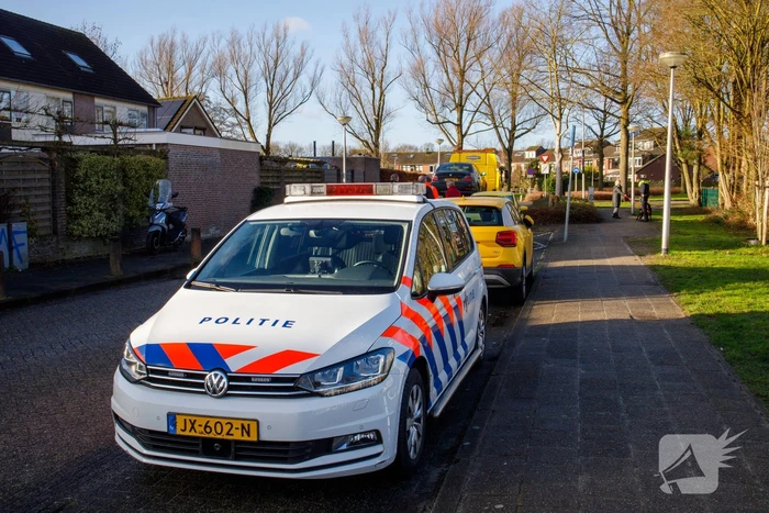 Fietsster geschept door auto