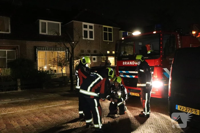 Brandweer blust schoorsteenbrand