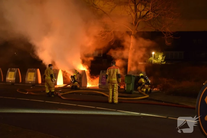 Brand in meerdere papiercontainers