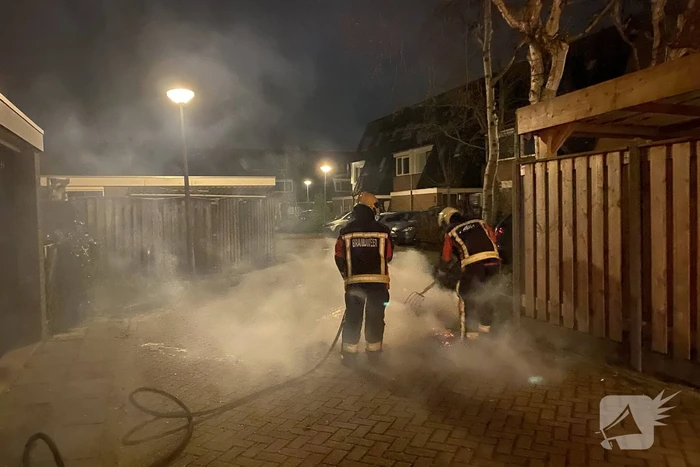 Berg rommel in brand gestoken