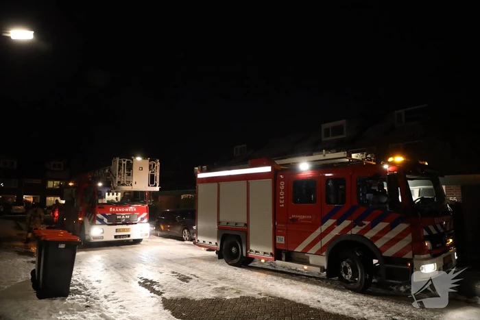 Rookwolken bij brand in schoorsteen