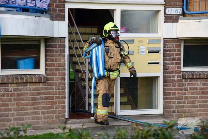 Veel schade bij brand in portiekwoning