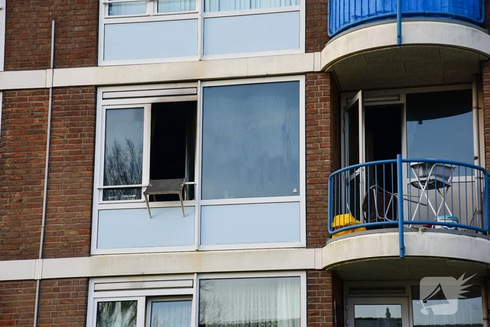Veel schade bij brand in portiekwoning