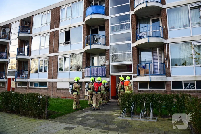 Veel schade bij brand in portiekwoning