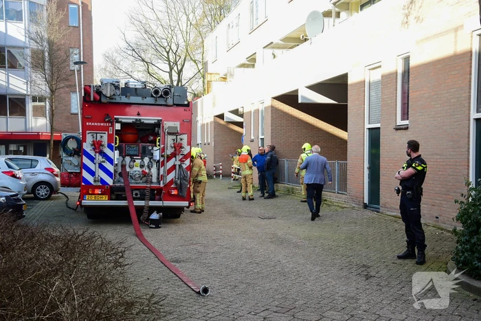 Flatwoningen ontruimd door brand
