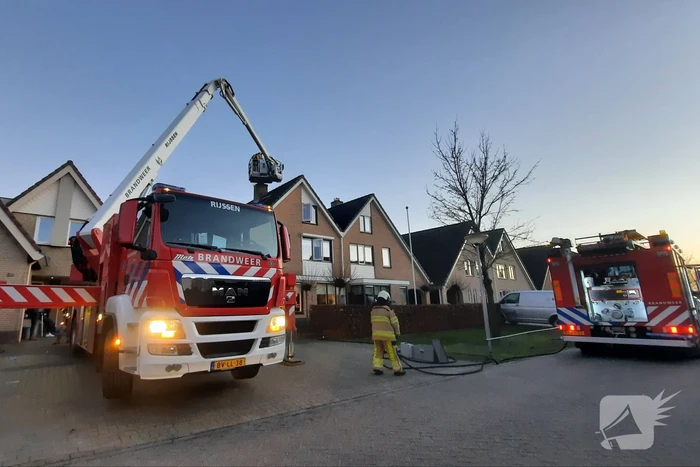 Schoorsteen geveegd na brand