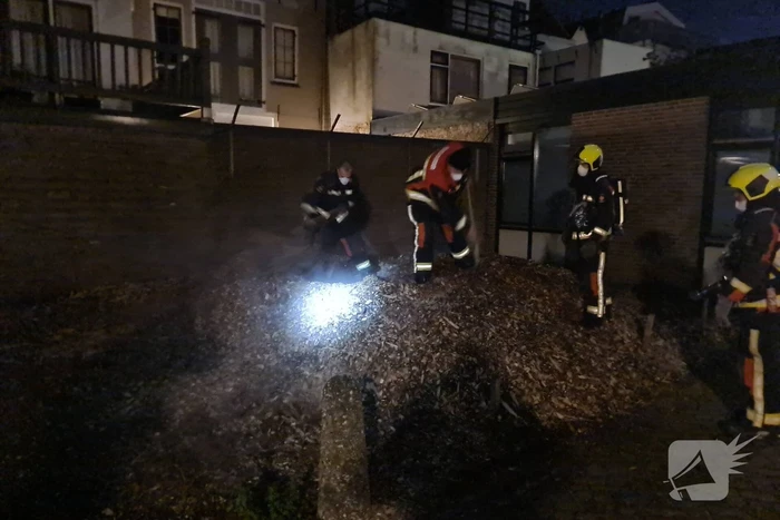 Berg met houtsnippers uit elkaar gehaald