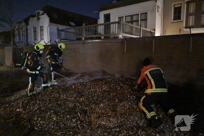 Berg met houtsnippers uit elkaar gehaald