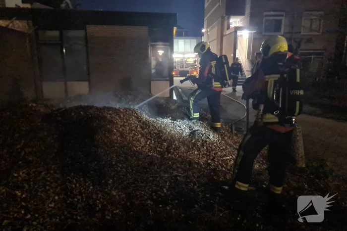 Berg met houtsnippers uit elkaar gehaald