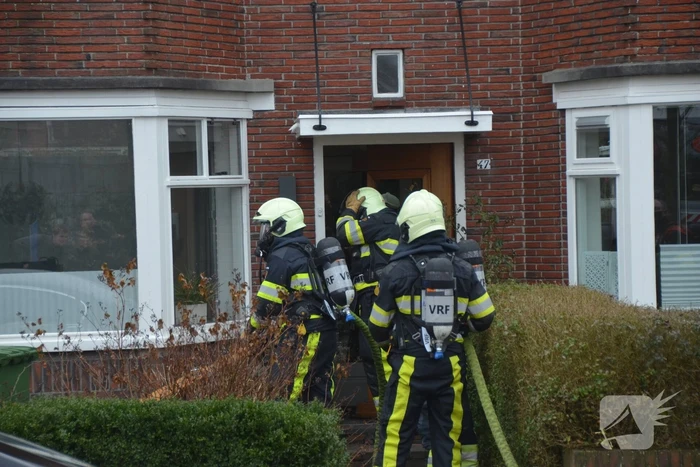 Brand achter woning
