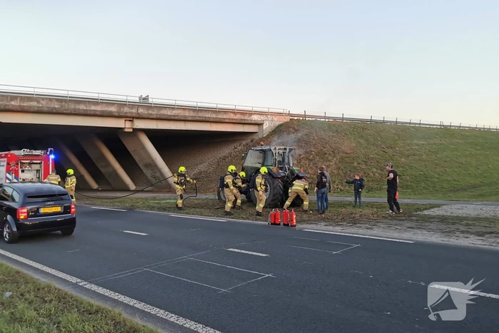 Tractor met aanhanger vlam gevat