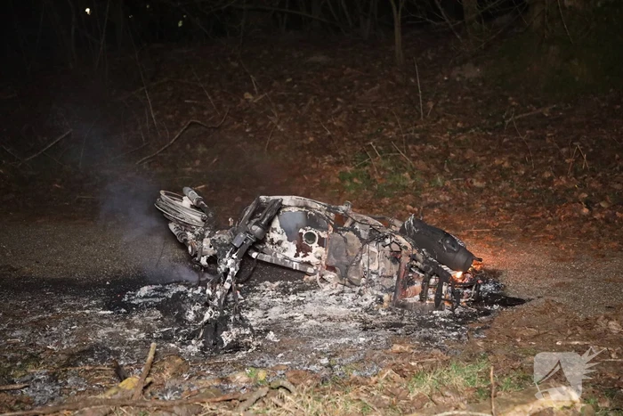 Scooter in brand gestoken