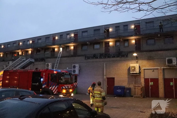 Brand in flatwoning boven winkels