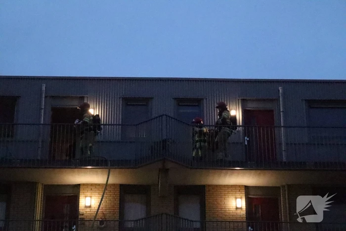 Brand in flatwoning boven winkels