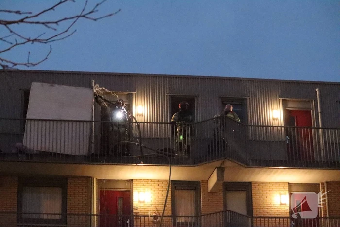 Brand in flatwoning boven winkels