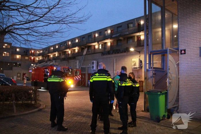 Brand in flatwoning boven winkels