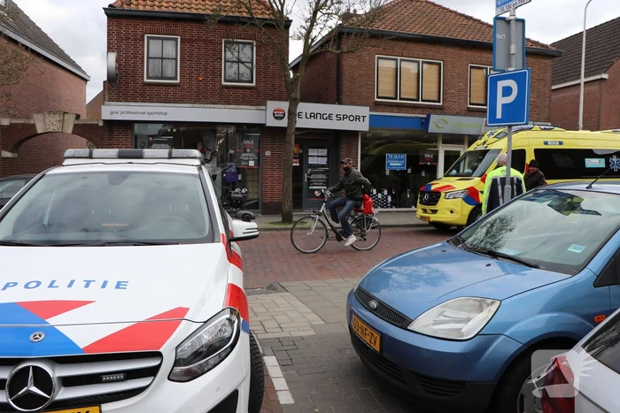 Man met scootmobiel ten val
