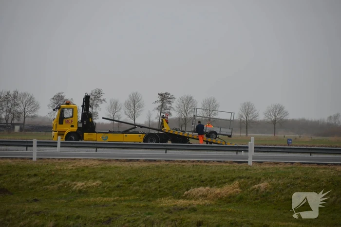 Aanhangwagen van oprit gehaald