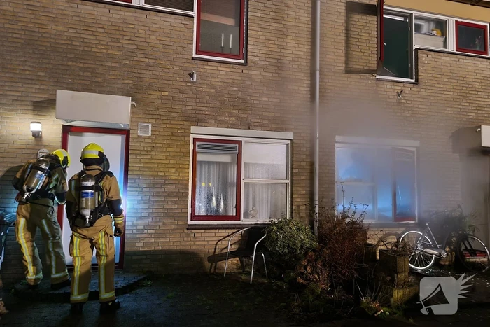 Forse rookontwikkeling bij woningbrand