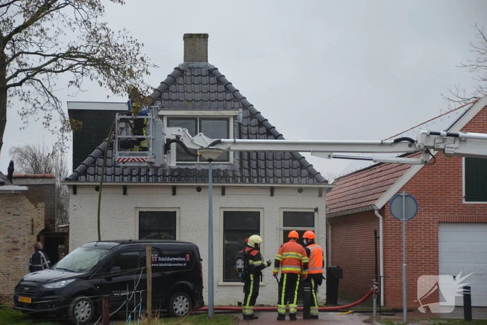 Woning vol rook bij brand