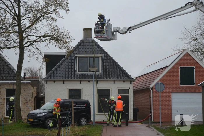 Woning vol rook bij brand