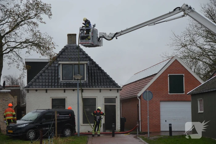 Woning vol rook bij brand