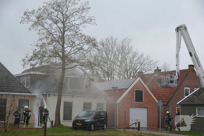 Woning vol rook bij brand