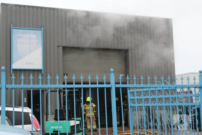 Veel rookontwikkeling na brand in machine