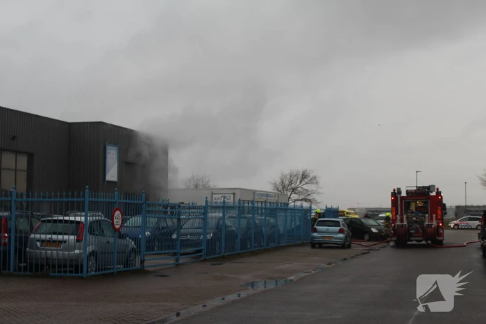 Veel rookontwikkeling na brand in machine