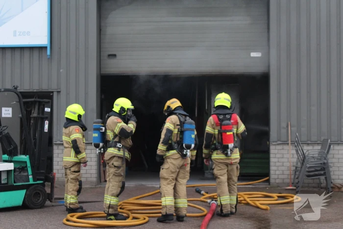 Veel rookontwikkeling na brand in machine