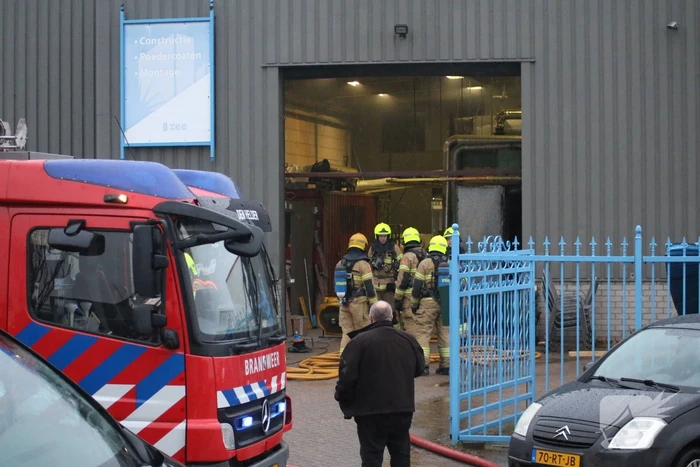 Veel rookontwikkeling na brand in machine