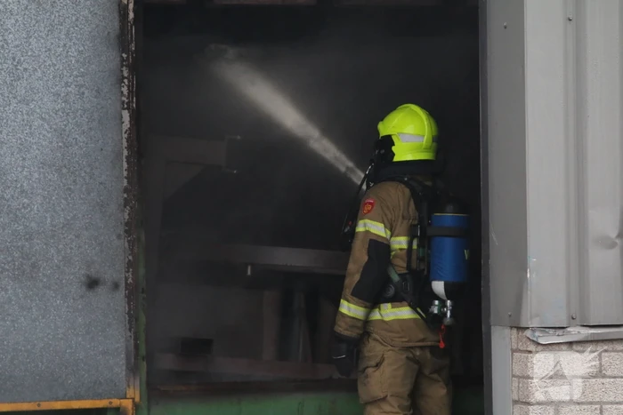 Veel rookontwikkeling na brand in machine