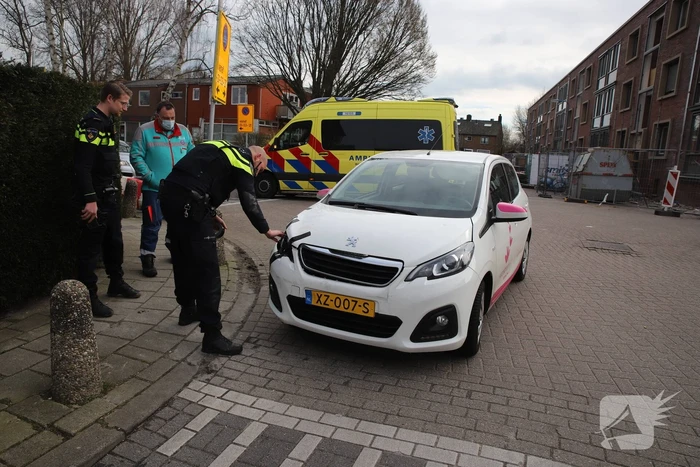 Schade bij aanrijding tussen twee auto's