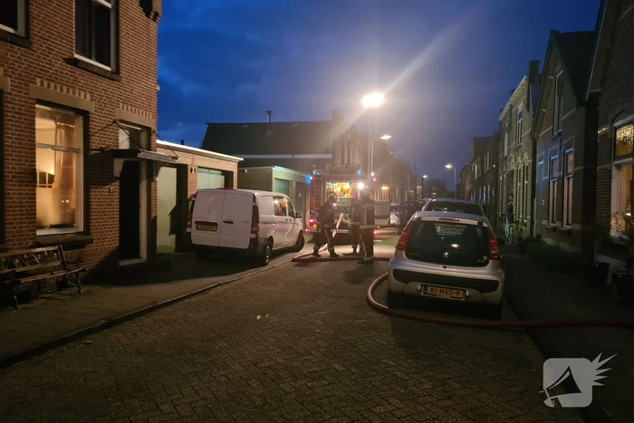 Veel rook door schoorsteenbrand