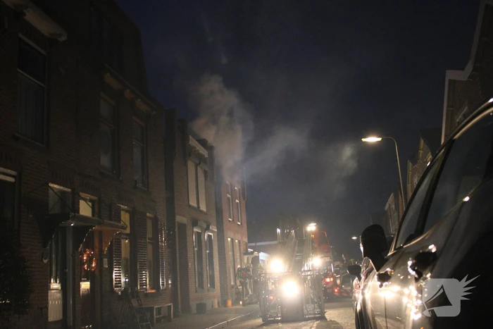 Veel rook door schoorsteenbrand