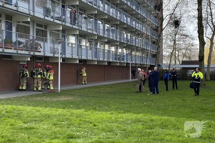 Brand in berging van flatgebouw