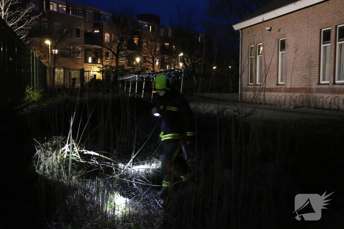 Stuk gras in brand
