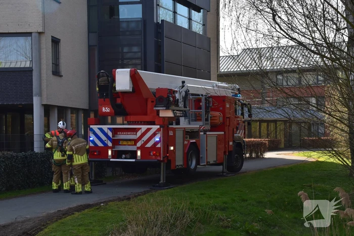 Glazenwasser vast in op hol geslagen lift