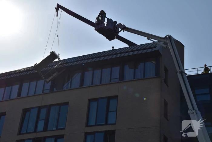 Glazenwasser vast in op hol geslagen lift