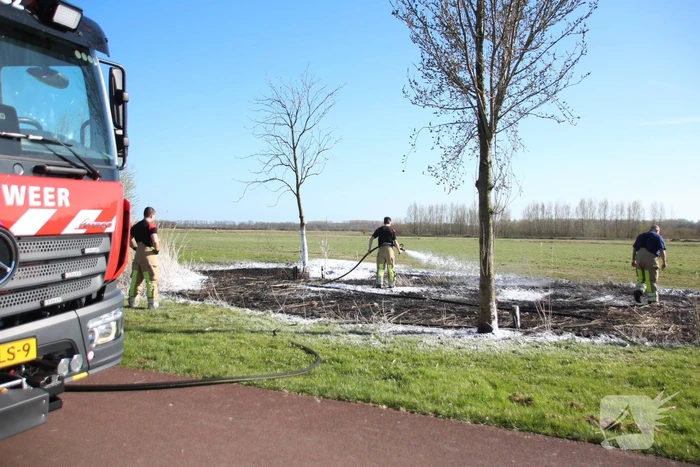 Stuk veld beschadigd door brand