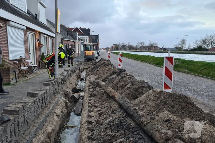 Stoeptegels gevallen op leiding