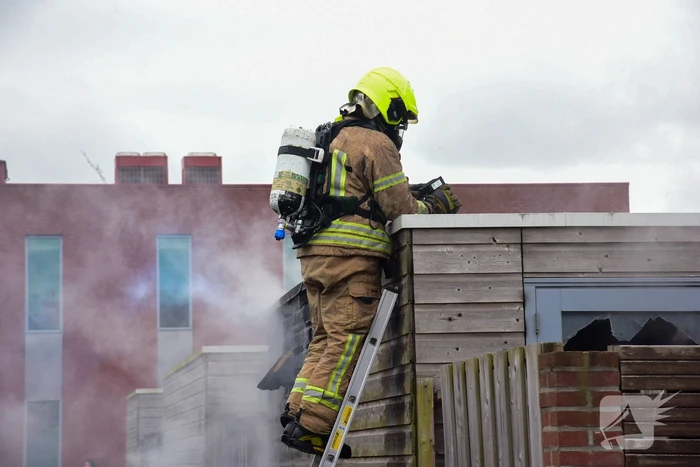 Uitslaande brand in schuur