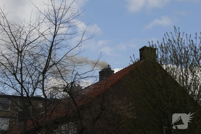 Veel rook bij brand in schoorsteen
