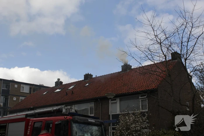 Veel rook bij brand in schoorsteen