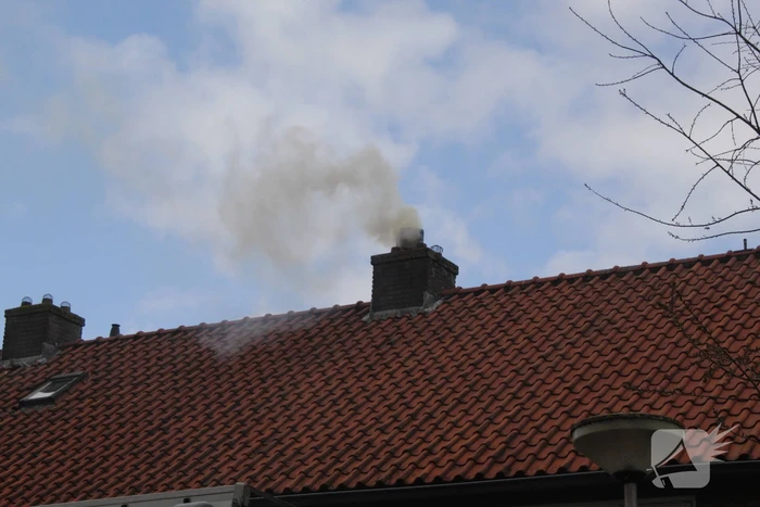 Veel rook bij brand in schoorsteen