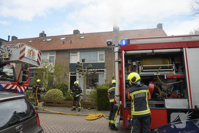 Veel rook bij brand in schoorsteen