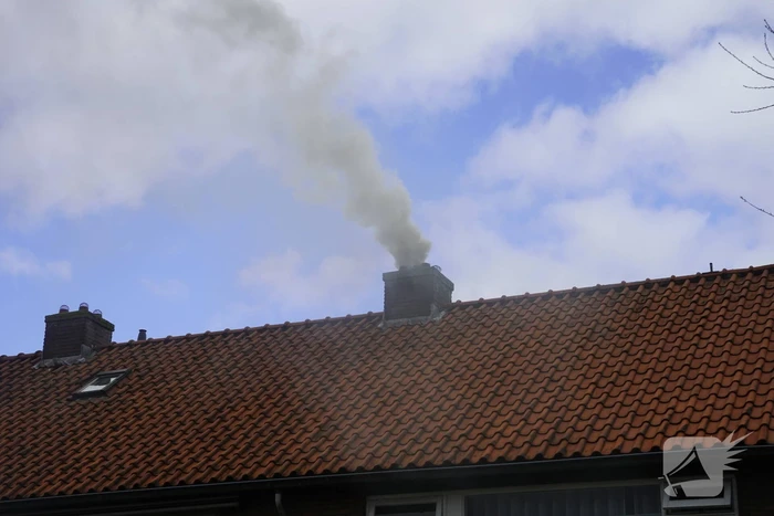 Veel rook bij brand in schoorsteen