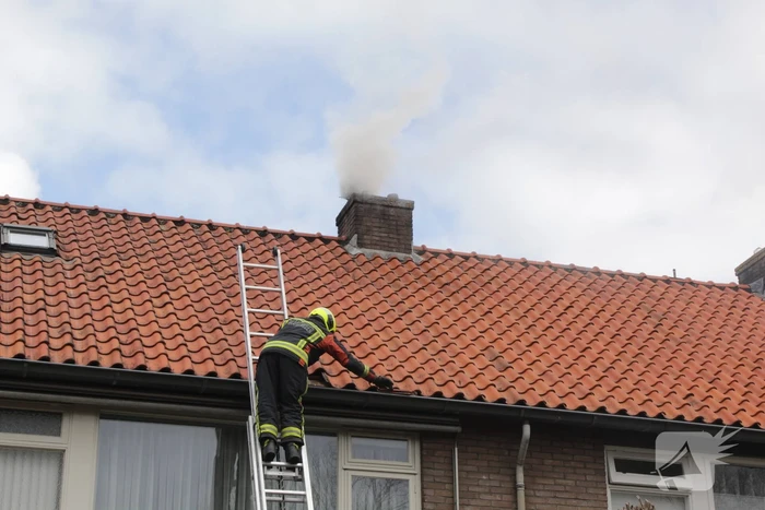 Veel rook bij brand in schoorsteen