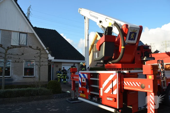 Schoorsteen geveegd na brand